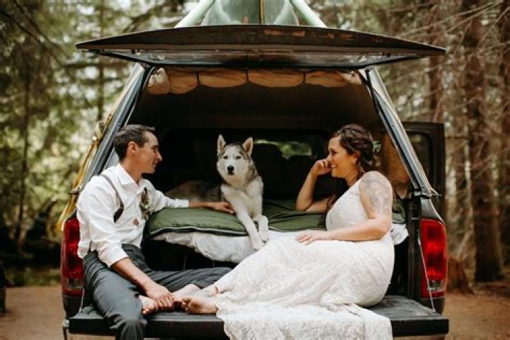 Can a dog be buried with a person?