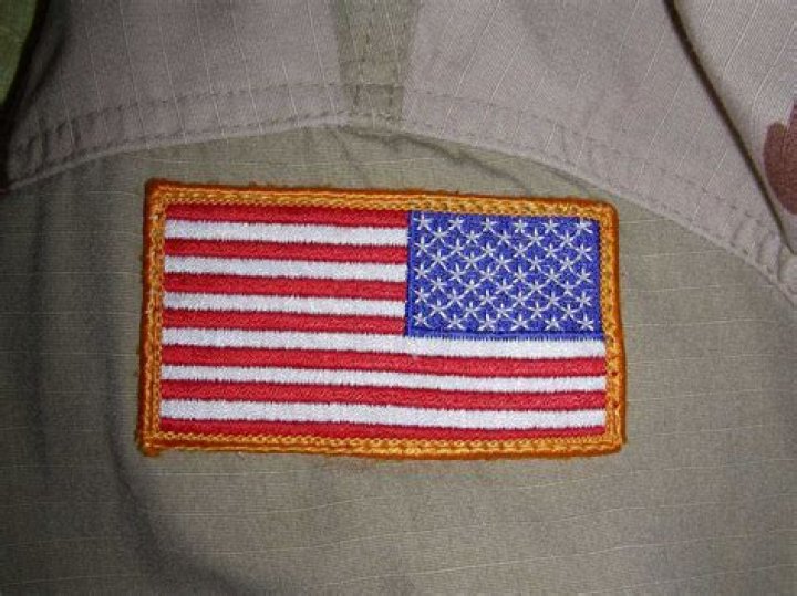 Can civilians wear American flag patches?