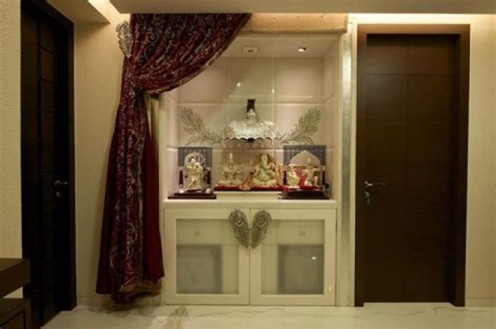 Can I keep pooja room in Hall?