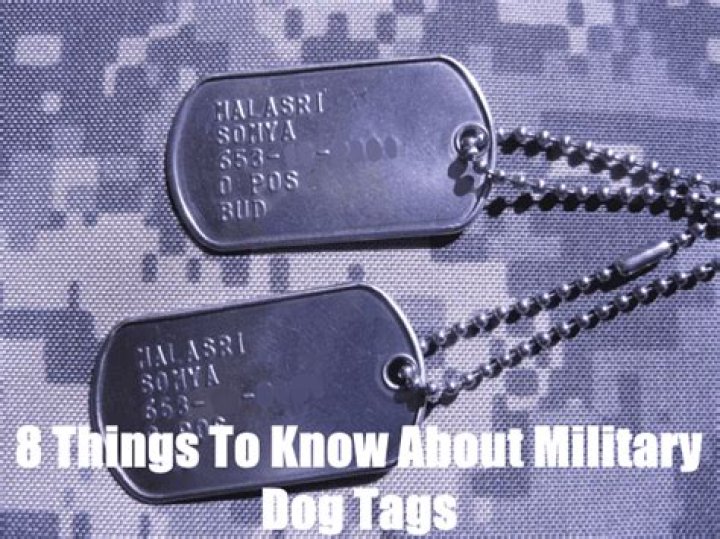 Can you wear a cross on your dog tags?
