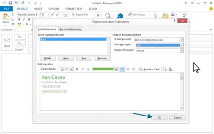 How do I add a business card to my Outlook signature?