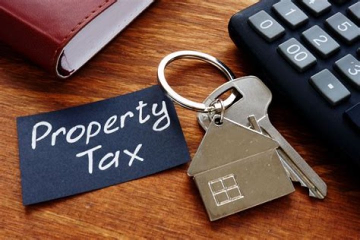 How does a condo owner pay property tax?