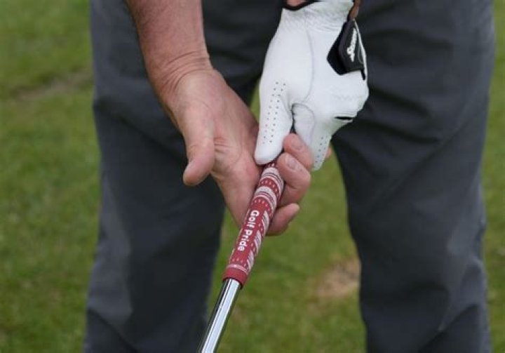 How does golf grip size affect ball flight?