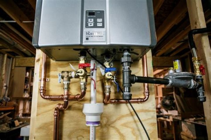 How high should a tankless water heater be installed?