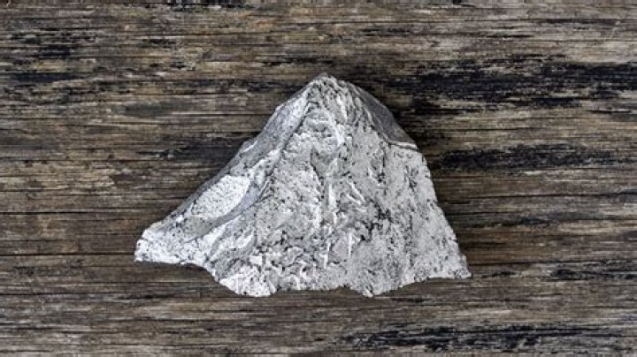 How is silver formed naturally?