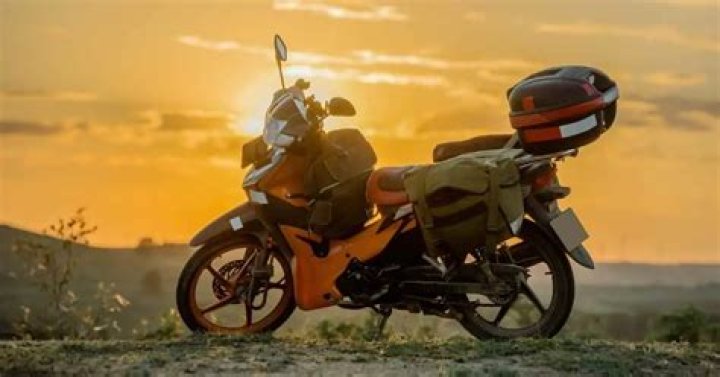 How often should you stop when riding a motorcycle?