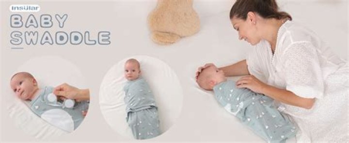 Is it OK to swaddle baby with arms out?