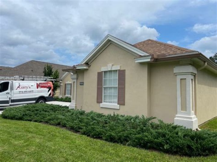 Is it safe to power wash a stucco house?