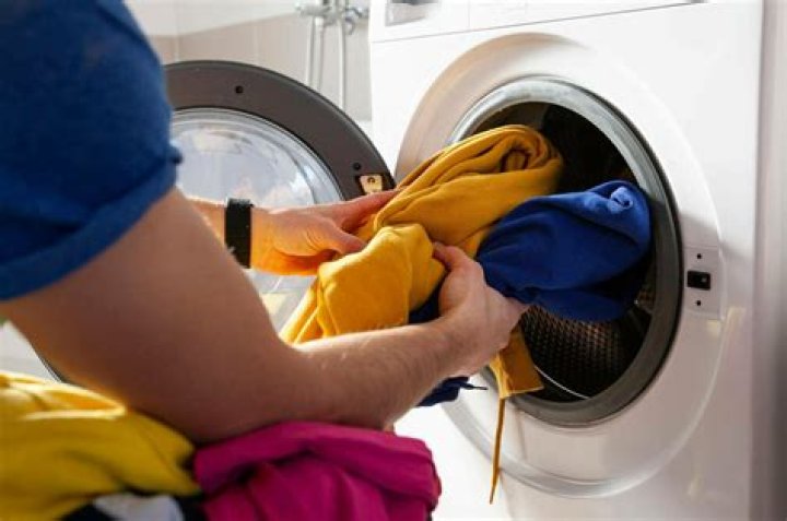 Should I wash clothes before recycling?