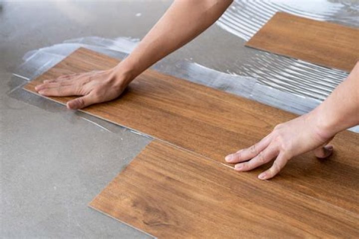 What adhesive do I use for vinyl flooring?
