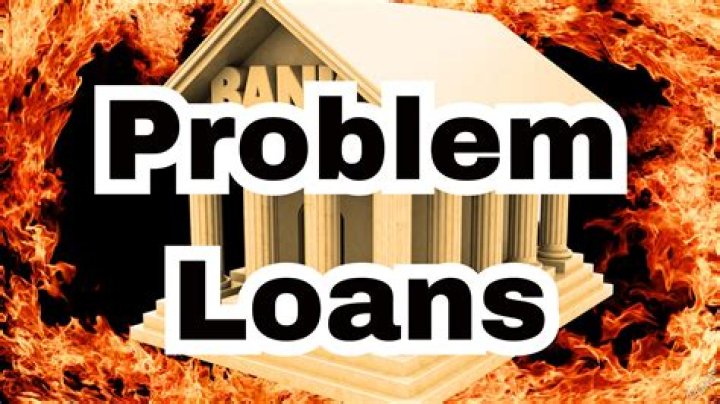 What are the causes of problem loans?