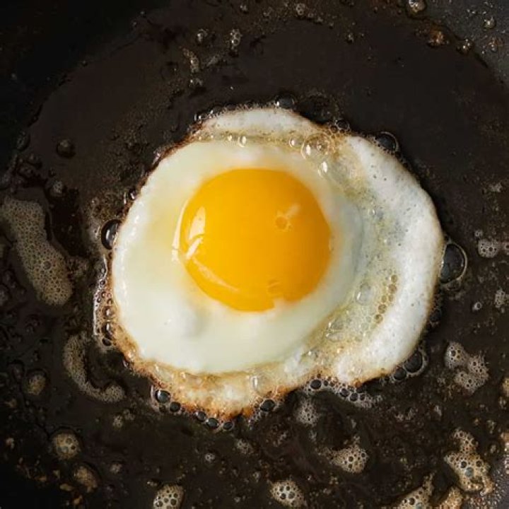 What is a fried egg with a broken yolk called?