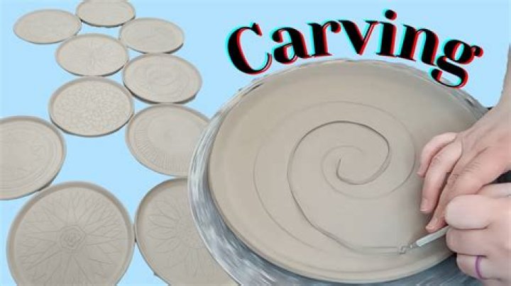 What is carving into clay called?
