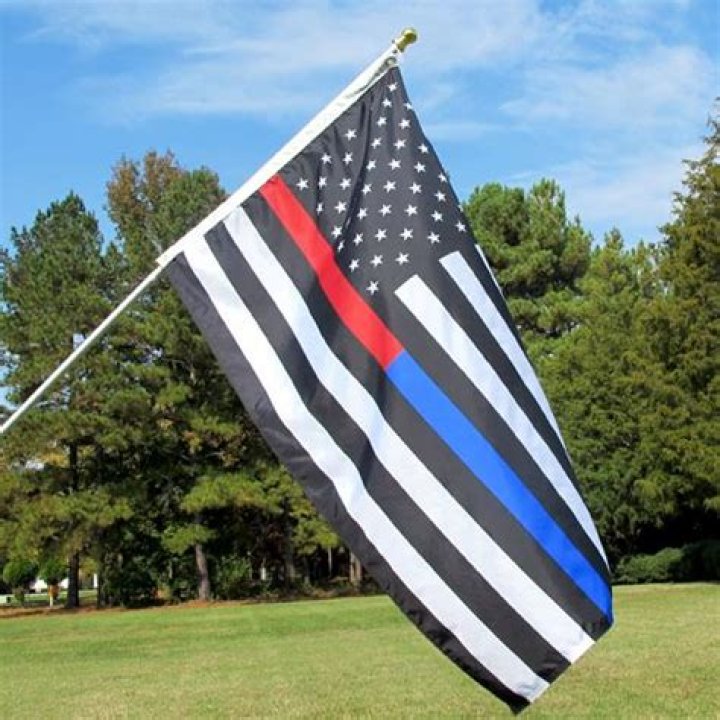 What is the black US flag with blue stripe?