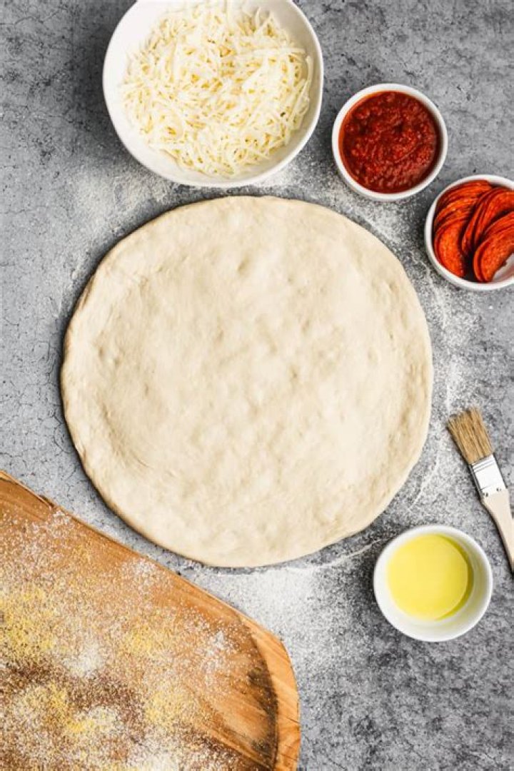 What temperature do you cook pre made pizza dough at?