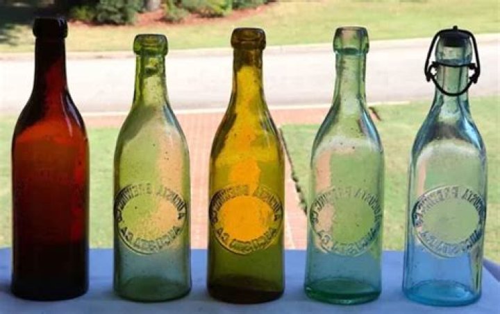 Why are beer bottles green or brown?