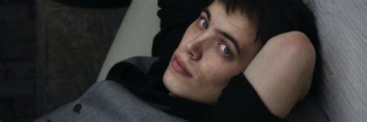 Why do guys put their arms behind their head?