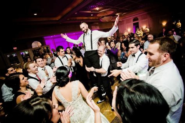 Why does the groom take the garter off?