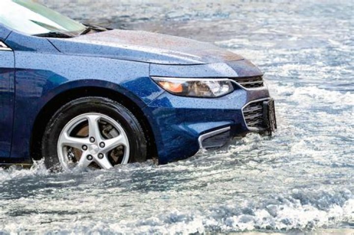 Why is my car sputtering after driving through water?