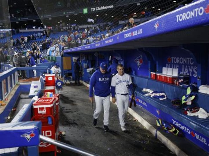 Why is Yankees dugout on first base side?