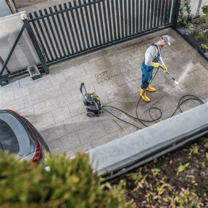 Will a pressure washer remove paint from concrete?